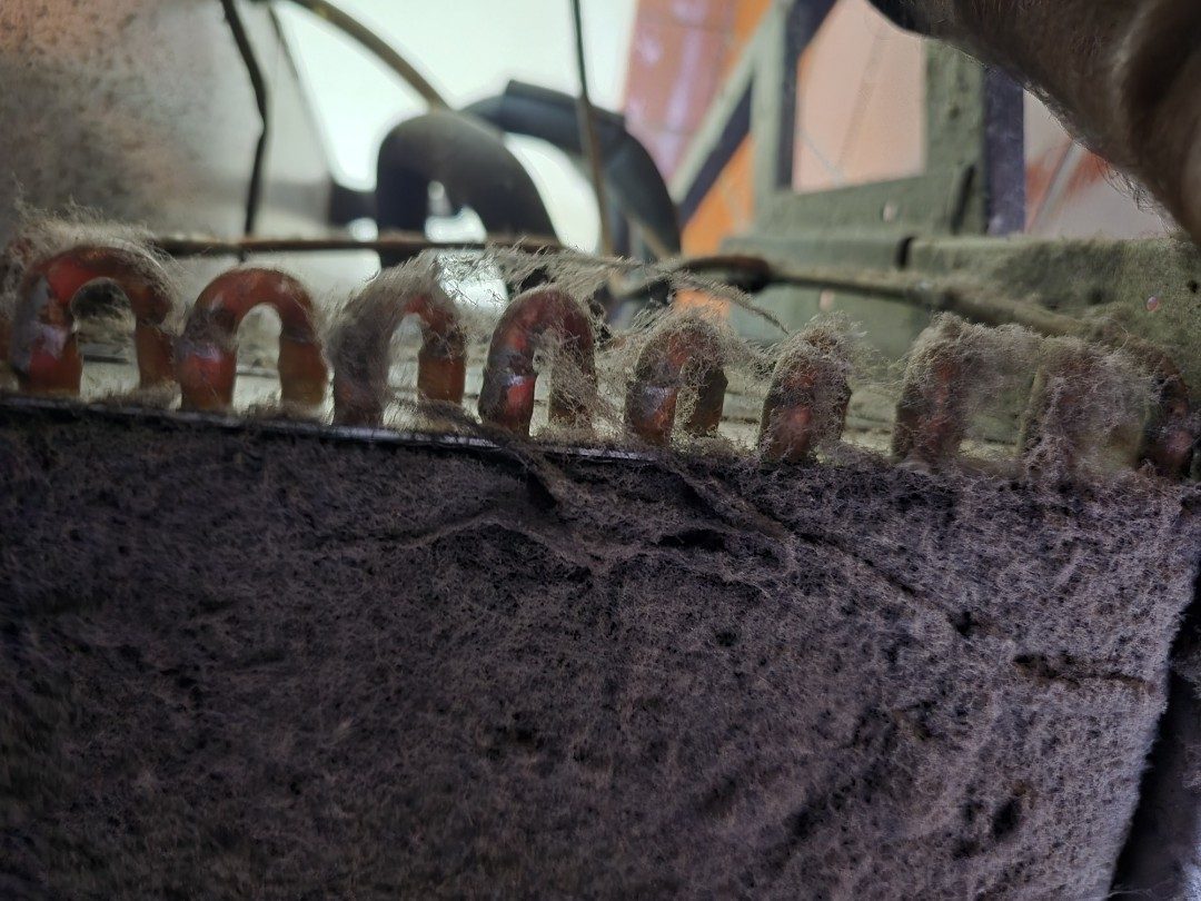 Matted dust covering evaporator coil fins