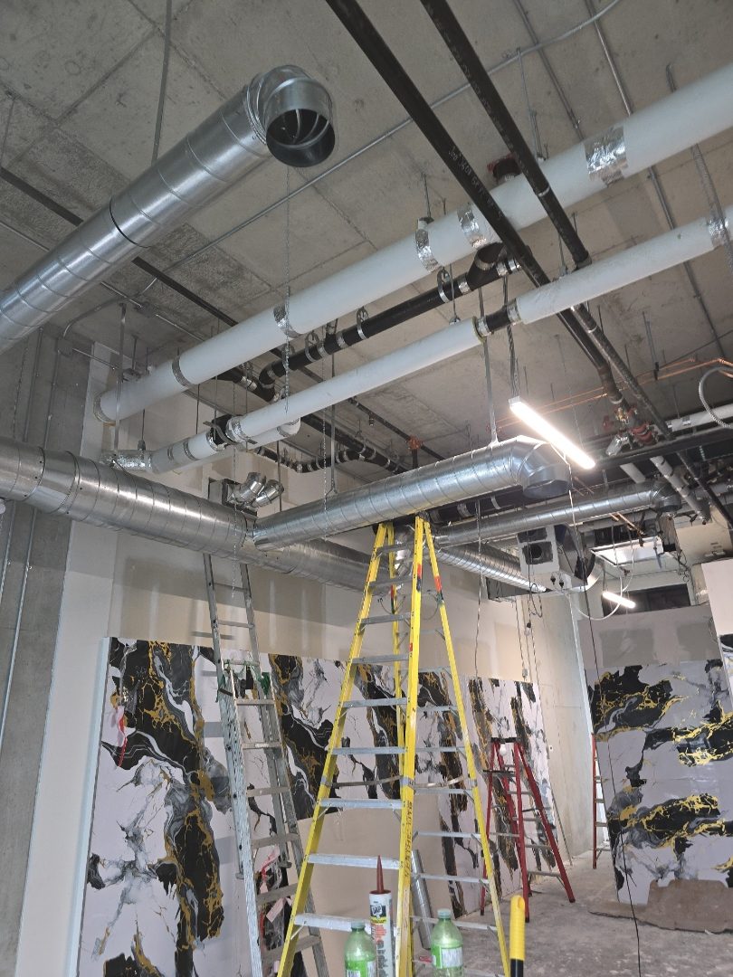 Mechanical room with spiral ducting during construction